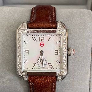 Mother of Pearl, diamonds & burgundy leather band.